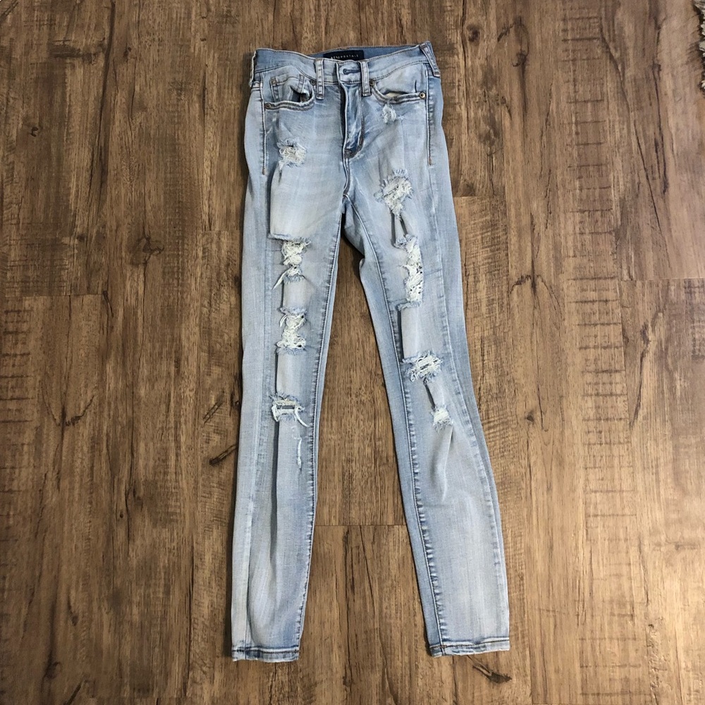 Ripped high-waisted skinny jeans